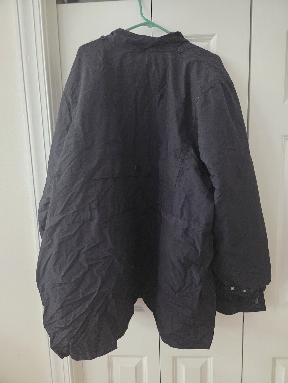 Woman Within Black Military-Style Field Jacket